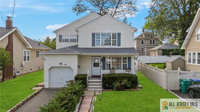 19 Edgegrove St, Edison, NJ 08837 - view of front of house with covered porch, asphalt driveway, and an attached garage