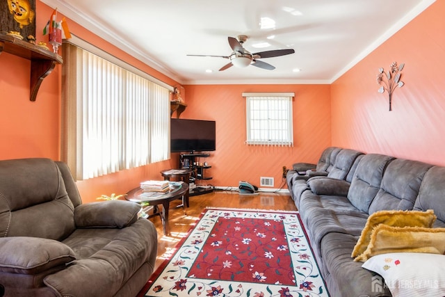 157 Orange St, Edison, NJ 08817 - living room featuring a ceiling fan, wood finished floors, and ornamental molding