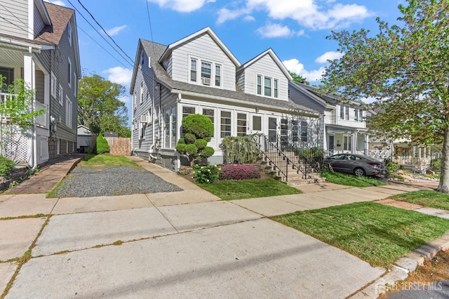 307 S 4th Ave, Highland Park, NJ 08904 - view of front of home featuring roof with shingles
