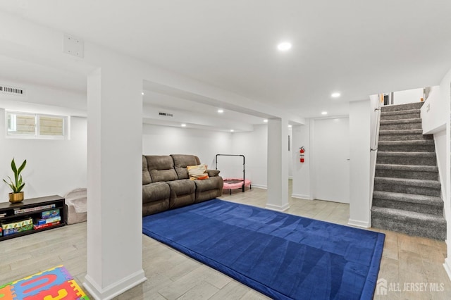 307 S 4th Ave, Highland Park, NJ 08904 - living room featuring stairs, wood finished floors, recessed lighting, and baseboards
