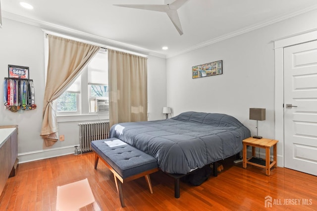 307 S 4th Ave, Highland Park, NJ 08904 - bedroom featuring radiator, ornamental molding, recessed lighting, wood finished floors, and baseboards