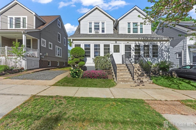 307 S 4th Ave, Highland Park, NJ 08904 - view of front of home with a shingled roof