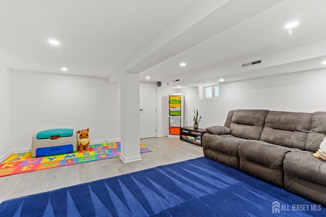 307 S 4th Ave, Highland Park, NJ 08904 - living room with wood finished floors, recessed lighting, and baseboards