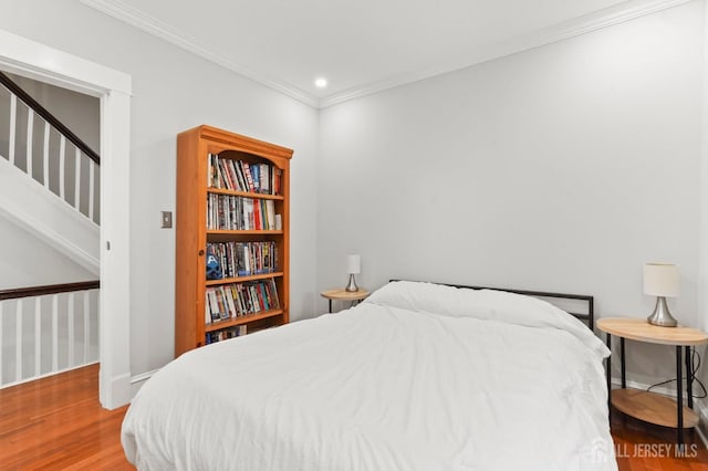 307 S 4th Ave, Highland Park, NJ 08904 - bedroom featuring wood finished floors, crown molding, baseboards, and recessed lighting