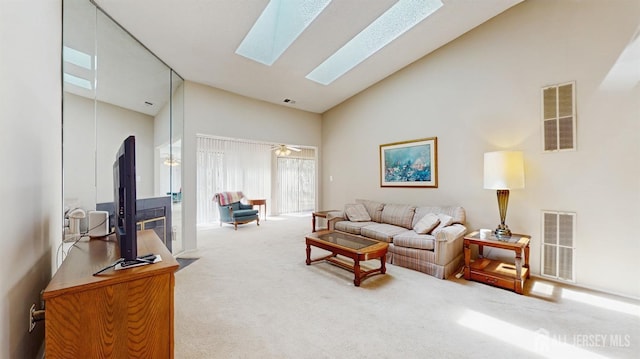 234 Wycoff Way E, Brunswick, NJ 08816 - living area with high vaulted ceiling, carpet, and a skylight