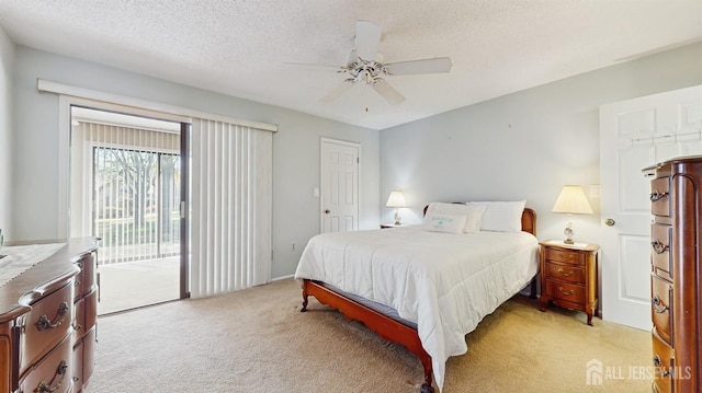234 Wycoff Way E, Brunswick, NJ 08816 - bedroom featuring light colored carpet, access to exterior, a textured ceiling, and a ceiling fan