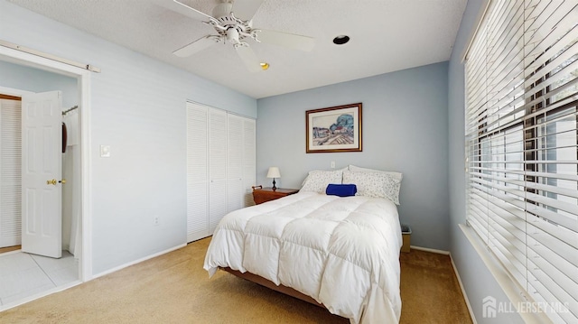 234 Wycoff Way E, Brunswick, NJ 08816 - bedroom with carpet floors, a closet, ceiling fan, and baseboards