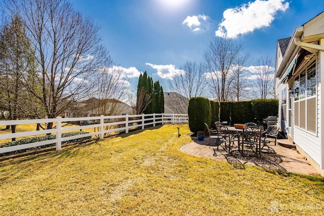 view of yard featuring a fenced backyard and a patio