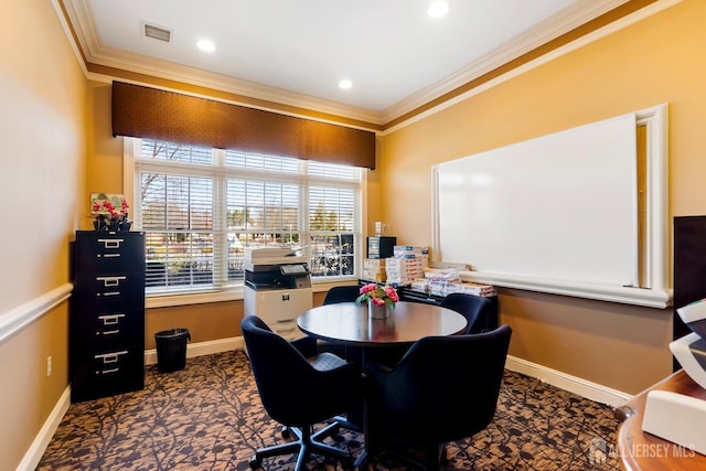 office with ornamental molding, visible vents, and baseboards