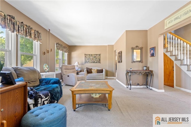 6 Hermann St, Carteret, NJ 07008 - living area featuring carpet flooring, stairway, and baseboards