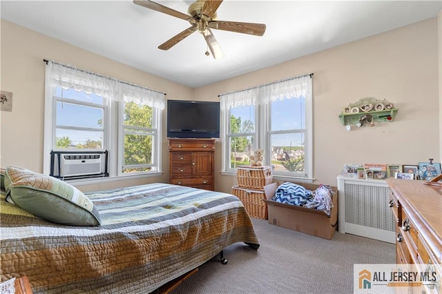 6 Hermann St, Carteret, NJ 07008 - carpeted bedroom with cooling unit and a ceiling fan
