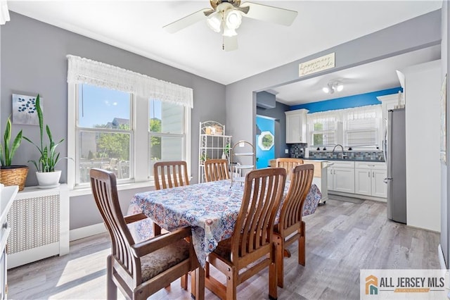 6 Hermann St, Carteret, NJ 07008 - dining room featuring ceiling fan and light wood-type flooring