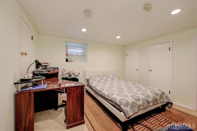 bedroom featuring recessed lighting and crown molding