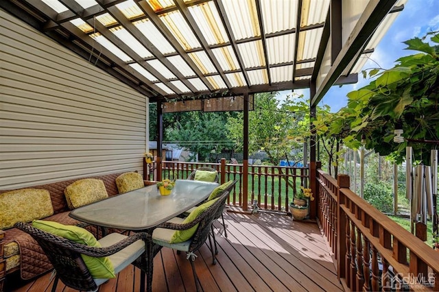 deck with outdoor dining space