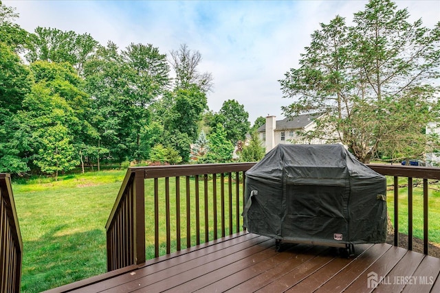 36 Jared Blvd, South Brunswick, NJ 08824 - wooden terrace with a yard and grilling area