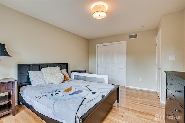 36 Jared Blvd, South Brunswick, NJ 08824 - bedroom with light wood-style flooring and a closet