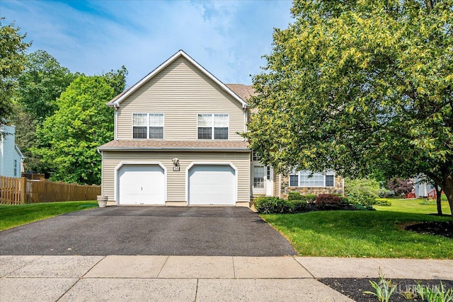 36 Jared Blvd, South Brunswick, NJ 08824 - view of front of property featuring driveway and a garage
