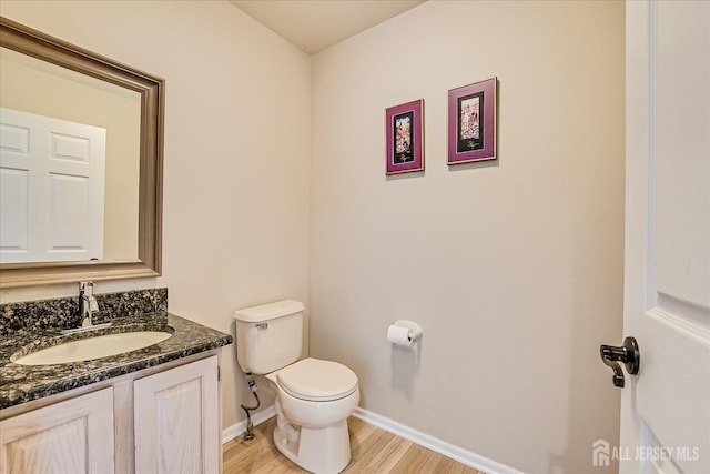 36 Jared Blvd, South Brunswick, NJ 08824 - half bath featuring vanity and wood finished floors