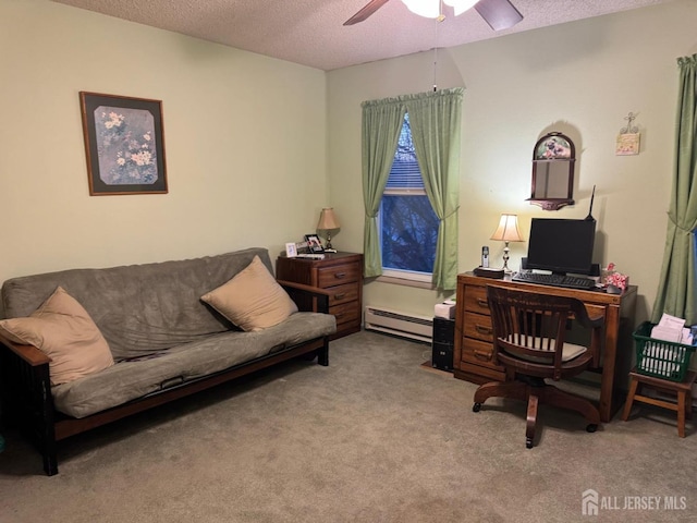 office area with baseboard heating, a textured ceiling, carpet, and a ceiling fan