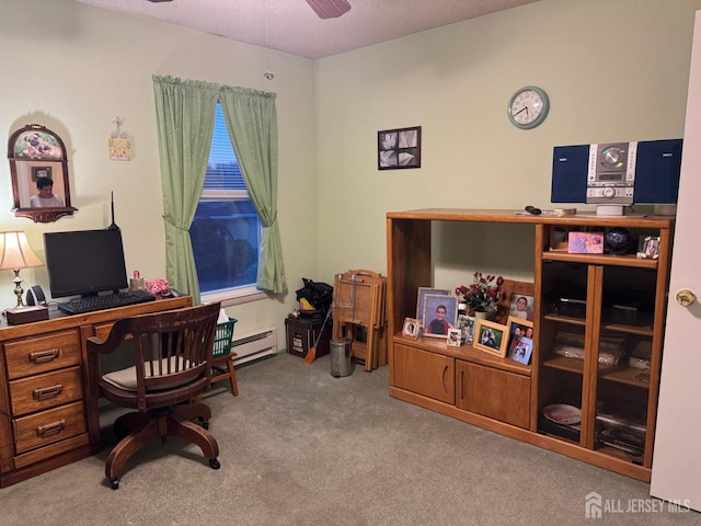 carpeted home office with a baseboard heating unit, a textured ceiling, and a ceiling fan