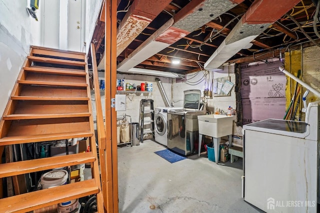 basement featuring separate washer and dryer