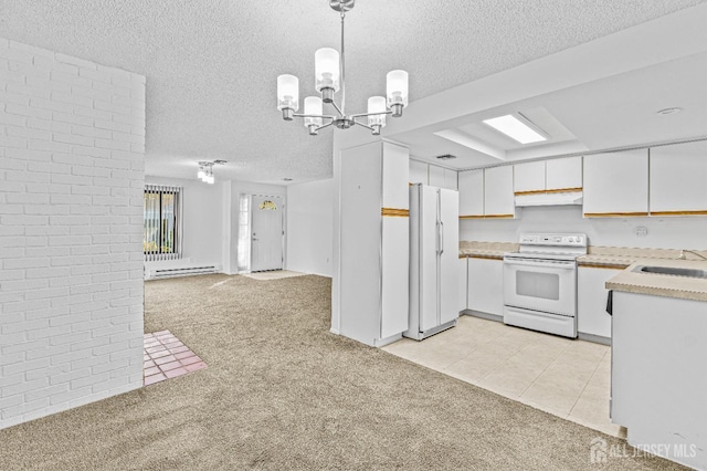6-A Aspen Plz, Monroe, NJ 08831 - kitchen with white appliances, light carpet, a textured ceiling, a chandelier, and light countertops