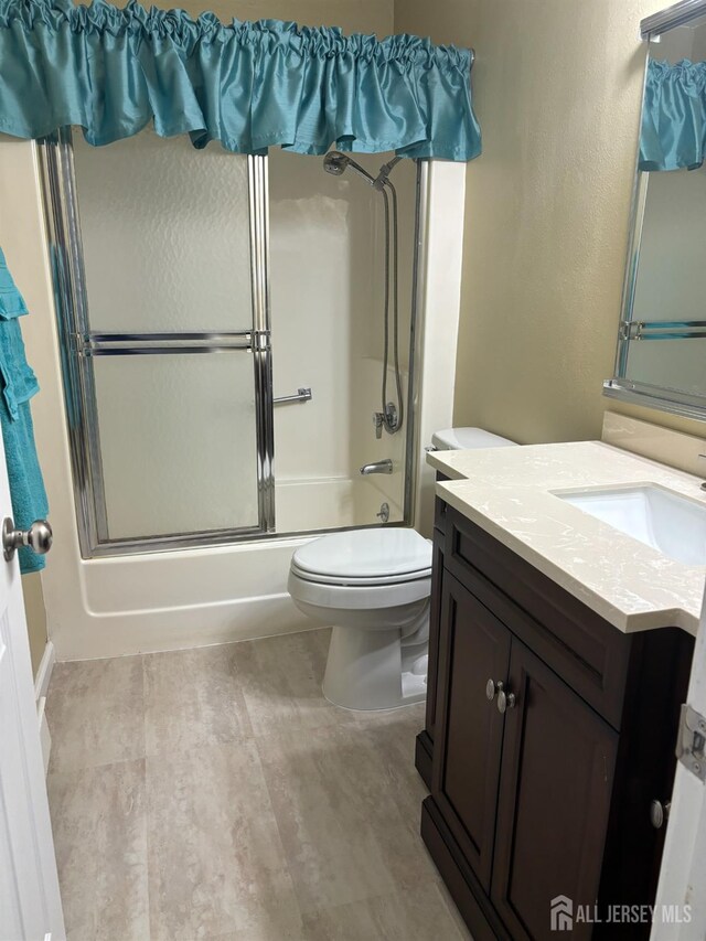 6-A Aspen Plz, Monroe, NJ 08831 - bathroom featuring vanity, toilet, and enclosed tub / shower combo