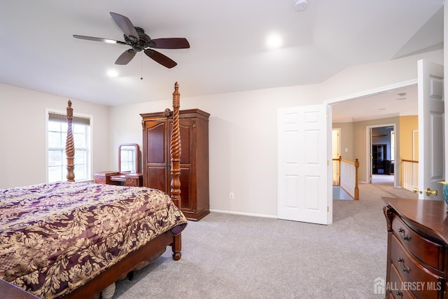 carpeted bedroom with baseboards and a ceiling fan