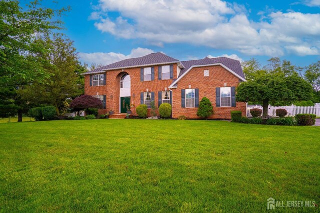 10 Magnolia Ct, Monroe, NJ 08831 - colonial-style house featuring brick siding