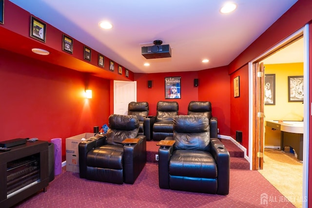 carpeted home theater room featuring recessed lighting and baseboards
