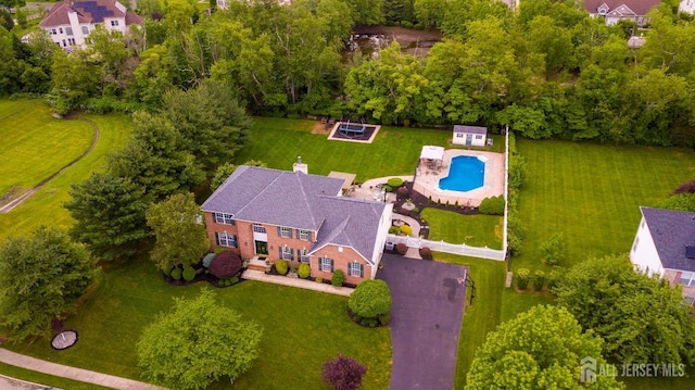 drone / aerial view of a pool area