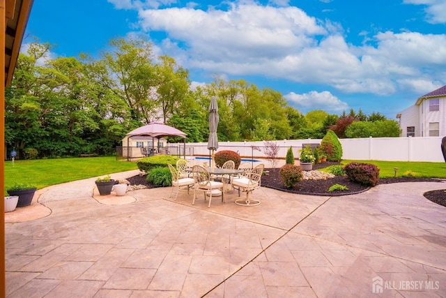 view of patio with outdoor dining area