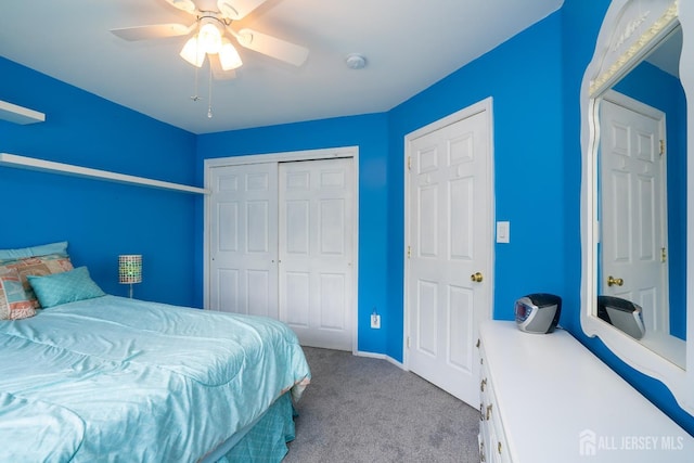 bedroom featuring carpet floors, a closet, and a ceiling fan