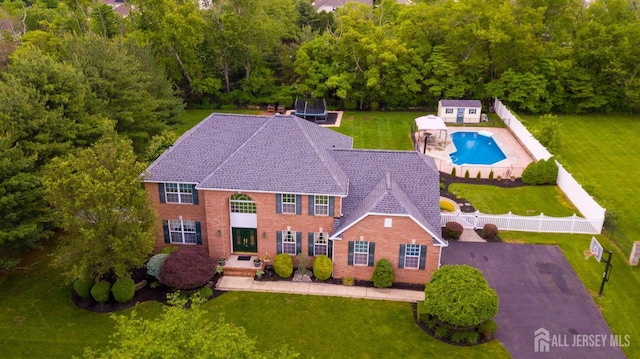 view from above of property featuring a pool