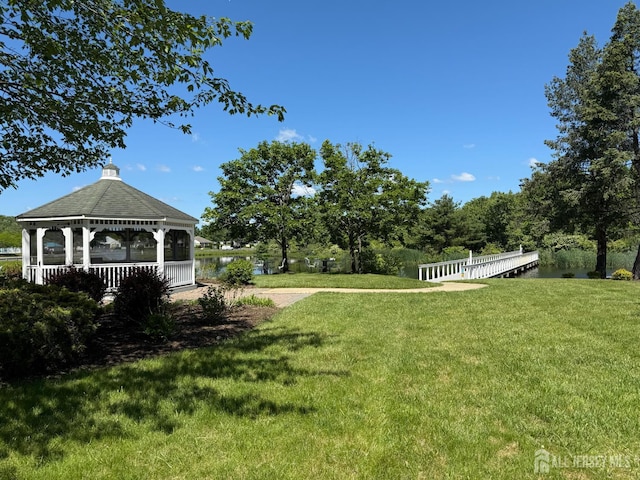 306 Kinglet Dr, Monroe, NJ 08831 - view of green lawn featuring a gazebo and a water view