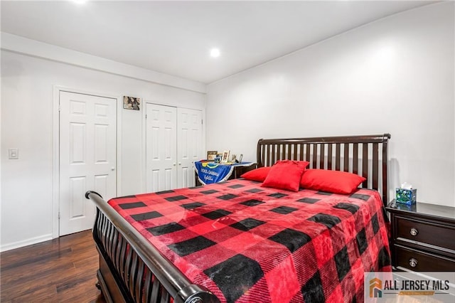 bedroom featuring dark wood-style floors, recessed lighting, and baseboards