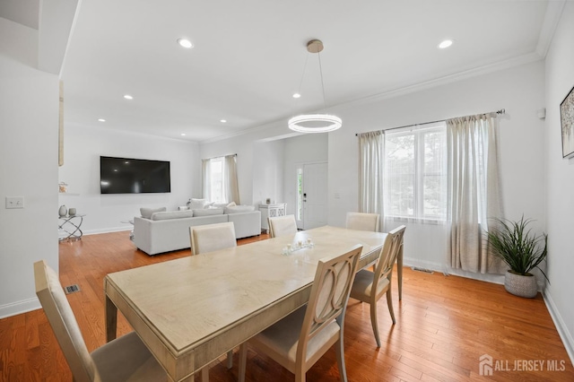 22 Sadowski Dr, Old Bridge, NJ 08857 - dining room with light wood-style floors, ornamental molding, and recessed lighting