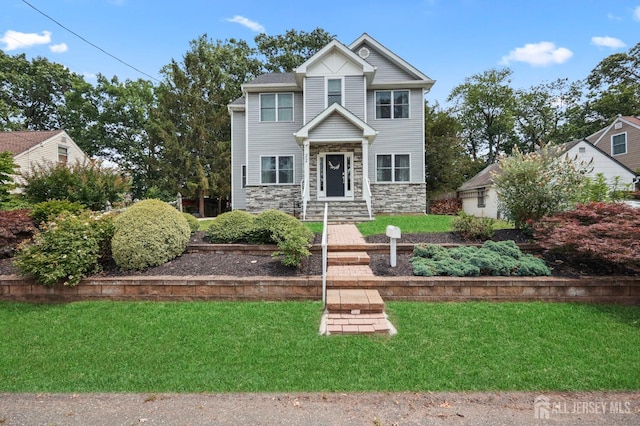 22 Sadowski Dr, Old Bridge, NJ 08857 - view of front of home featuring stone siding and a front lawn