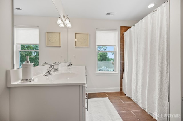 22 Sadowski Dr, Old Bridge, NJ 08857 - bathroom featuring double vanity and tile patterned floors