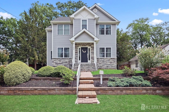 22 Sadowski Dr, Old Bridge, NJ 08857 - view of front of house featuring stone siding and a front lawn