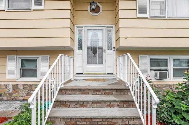 view of exterior entry with cooling unit