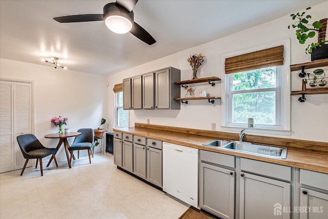 414 Graham St, Highland Park, NJ 08904 - kitchen with dishwasher, gray cabinets, and open shelves