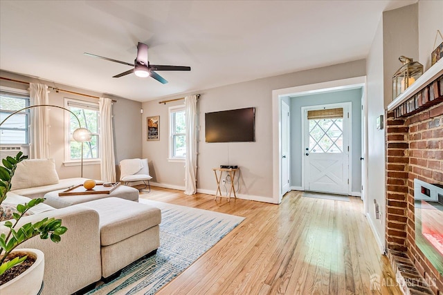 414 Graham St, Highland Park, NJ 08904 - living room featuring light wood-style floors and ceiling fan