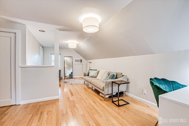 414 Graham St, Highland Park, NJ 08904 - living room featuring wood finished floors and vaulted ceiling