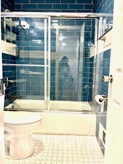 318 High St, Perth Amboy, NJ 08861 - bathroom with shower / bath combination with glass door