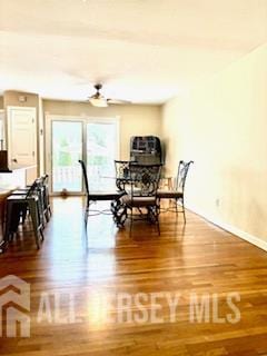 318 High St, Perth Amboy, NJ 08861 - dining area featuring wood finished floors and ceiling fan
