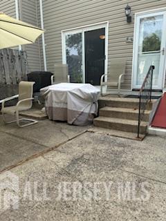 318 High St, Perth Amboy, NJ 08861 - view of patio featuring a grill