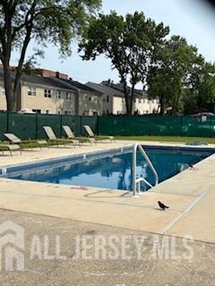 318 High St, Perth Amboy, NJ 08861 - community pool featuring a patio
