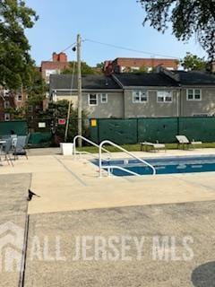 318 High St, Perth Amboy, NJ 08861 - community pool with a patio area