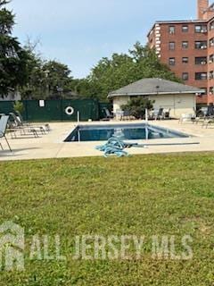 318 High St, Perth Amboy, NJ 08861 - community pool with a yard and a patio area